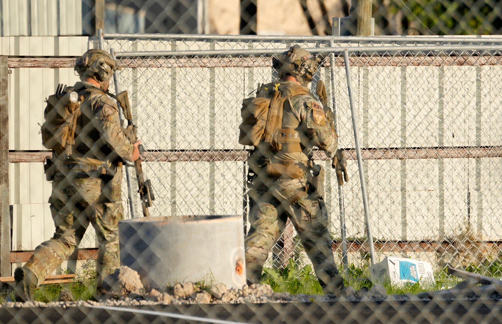 Harris County Sheriff's SWAT members are shown near Crescent Peak Drive where a police investigation continues Wednesday, Jan. 1, 2025, in Houston. A property on Crescent Peak Drive is associated with Shamsud-Din Jabbar, who is identified as the attacker in the New Orleans massacre. (Melissa Phillip/Houston Chronicle via AP)