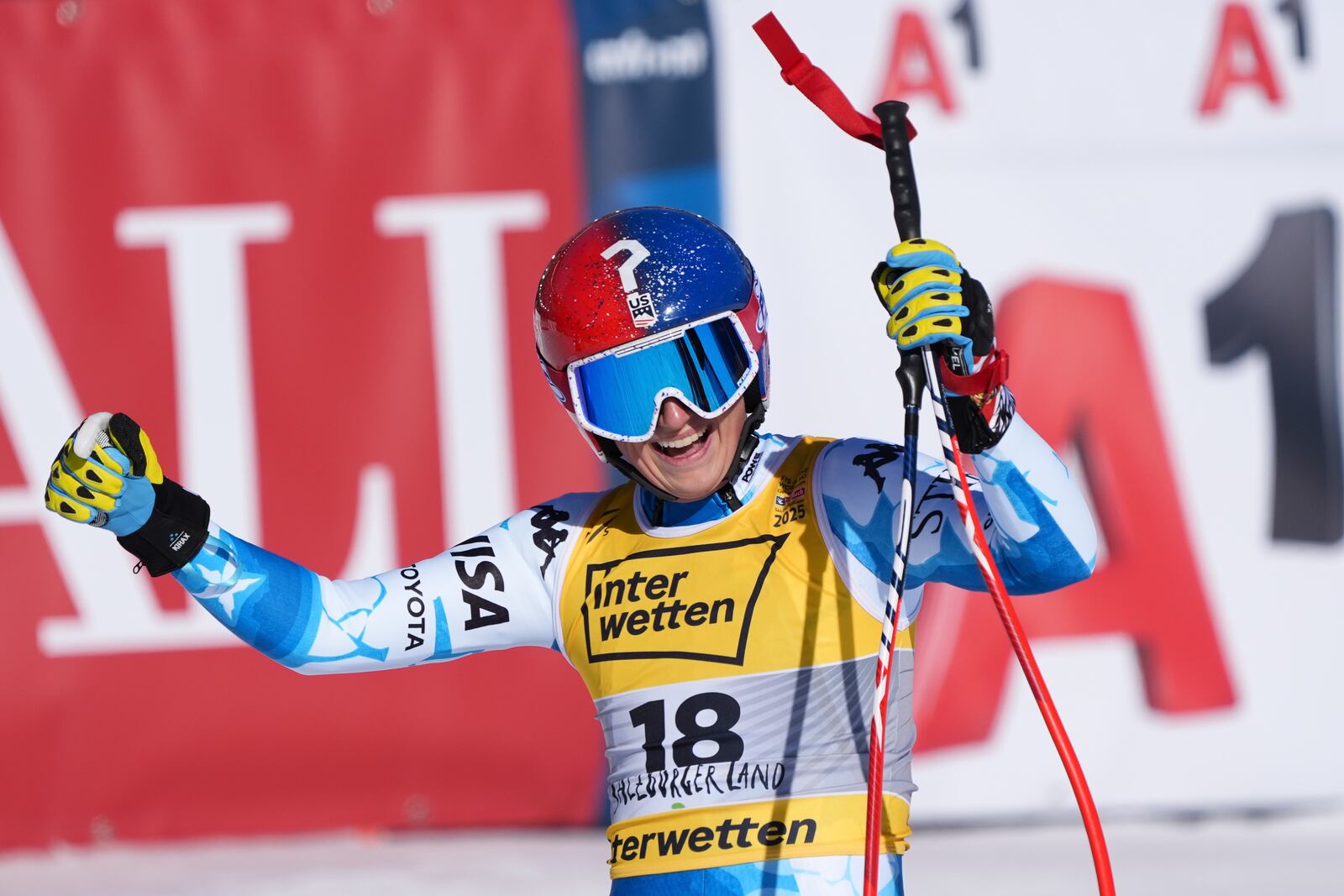 United States' Lauren Macuga celebrates at the finish area of a women's downhill race, at the Alpine Ski World Championships, in Saalbach-Hinterglemm, Austria, Saturday, Feb. 8, 2025. (AP Photo/Giovanni Auletta)