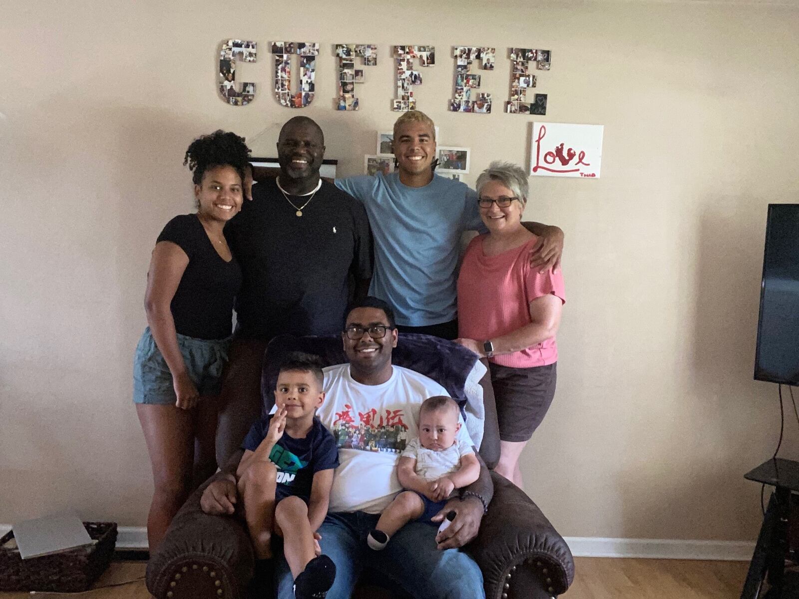 The Cuffee Family (left to right):  Myra (sister, who’ll play basketball at Marshall University this coming season), Linwood (dad), Elijah (brother who is star at Liberty University) Sara (mom.)  (Sitting in front) Jason with sons Zeke (left) and Theo (right). CONTRIBUTED