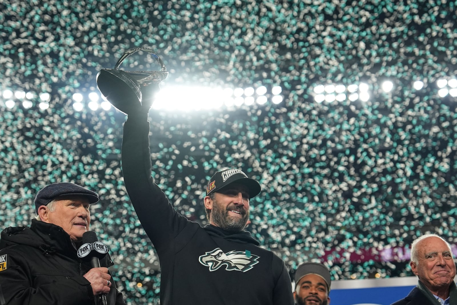 Philadelphia Eagles coach Nick Sirianni holds up the championship trophy after the Eagles won the NFC Championship NFL football game against the Washington Commanders, Sunday, Jan. 26, 2025, in Philadelphia. (AP Photo/Matt Slocum)