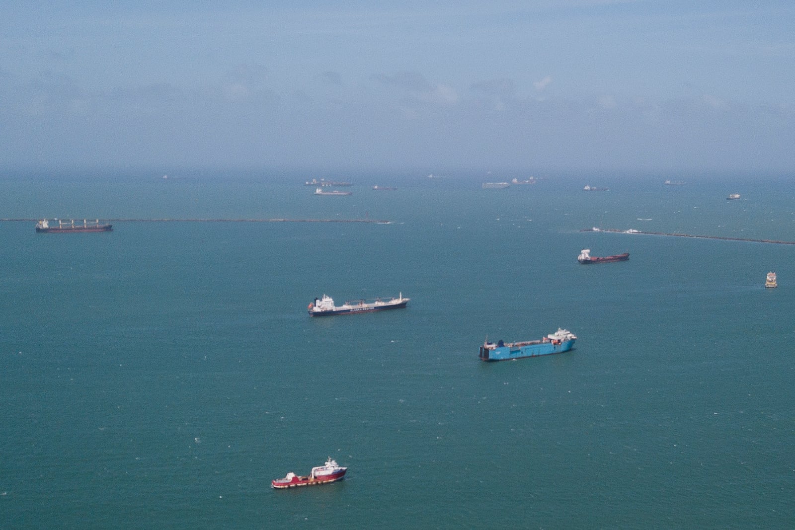 Cargo ships wait to transit the Panama Canal in Colon, Panama, Tuesday, Feb. 4, 2025. (AP Photo/Matias Delacroix)