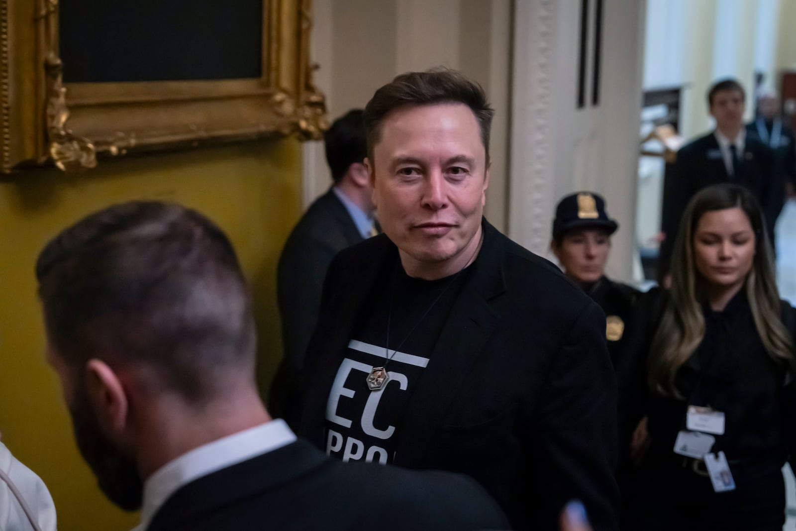 Elon Musk leaves after meeting with Senate Republicans, at the Capitol in Washington, Wednesday, March 5, 2025. (AP Photo/Ben Curtis)