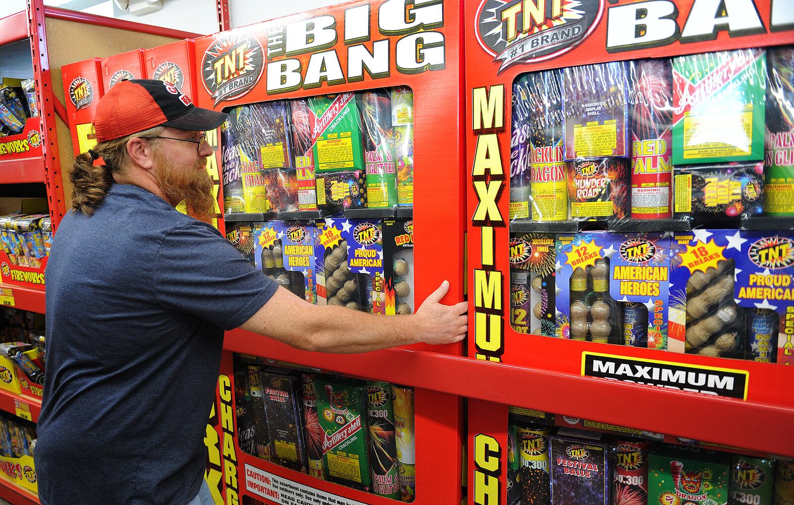 Martin Jones checks out the Big Bang Box of fireworks, Tuesday June 21, 2022 at TNT Fireworks located at 840 S. Union Rd. MARSHALL GORBY\STAFF