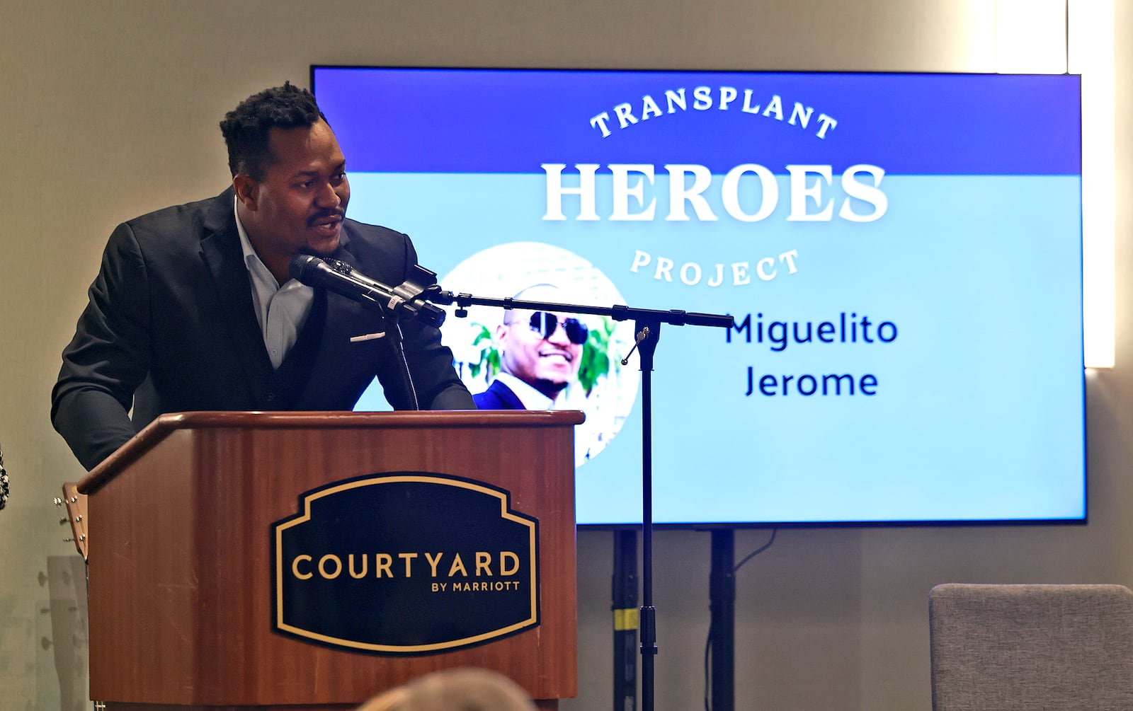 Miguelito Jerome speaks during the Mayor's Breakfast after being honored as a Transplant Hero Thursday, Nov. 21, 2024. BILL LACKEY/STAFF