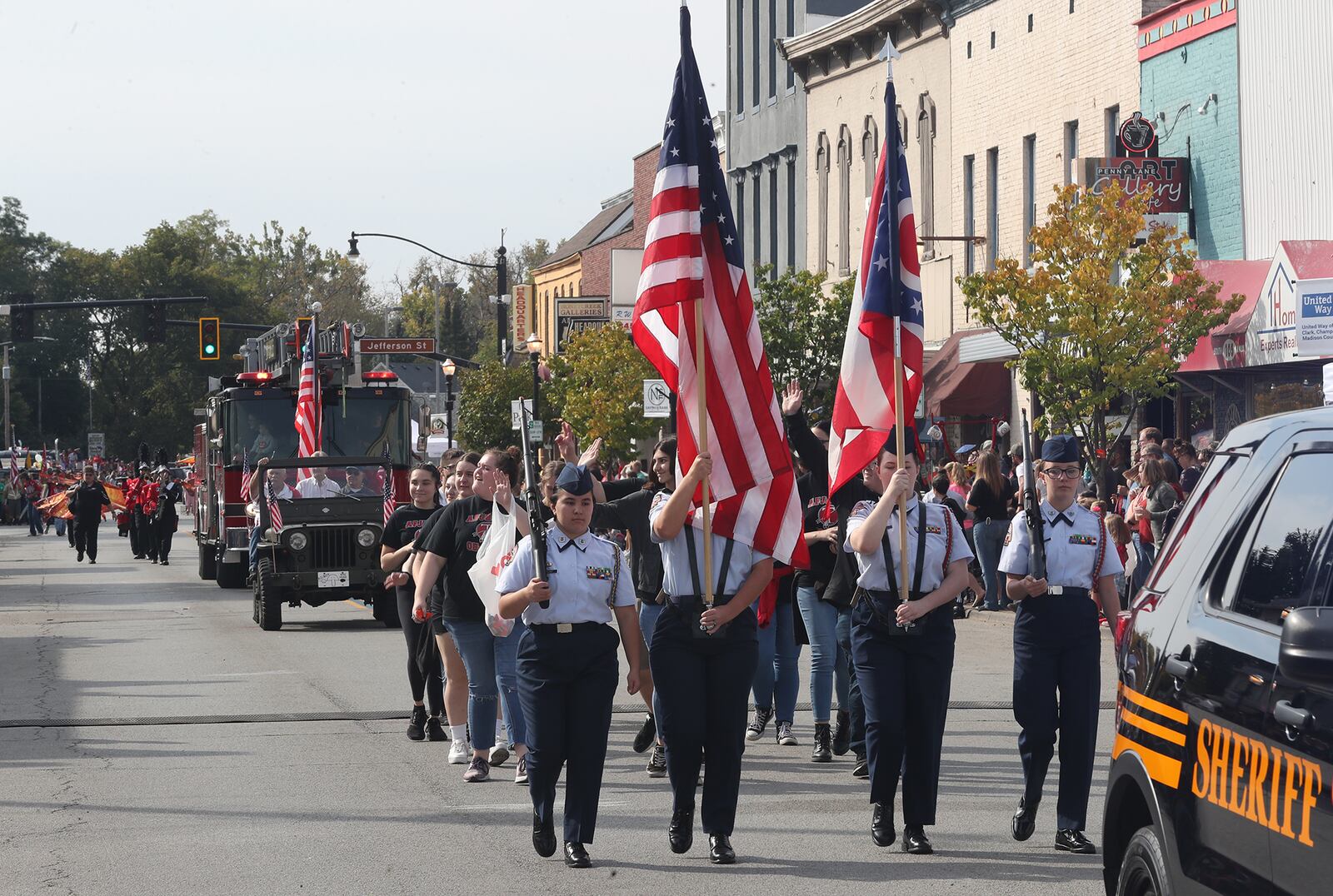 The Heritage of Flight Festival started Saturday with the Airplane Parade down Main Street. Hundreds of people lined the street to see the floats as well as the airplanes towed by vintage tractors. BILL LACKEY/STAFF