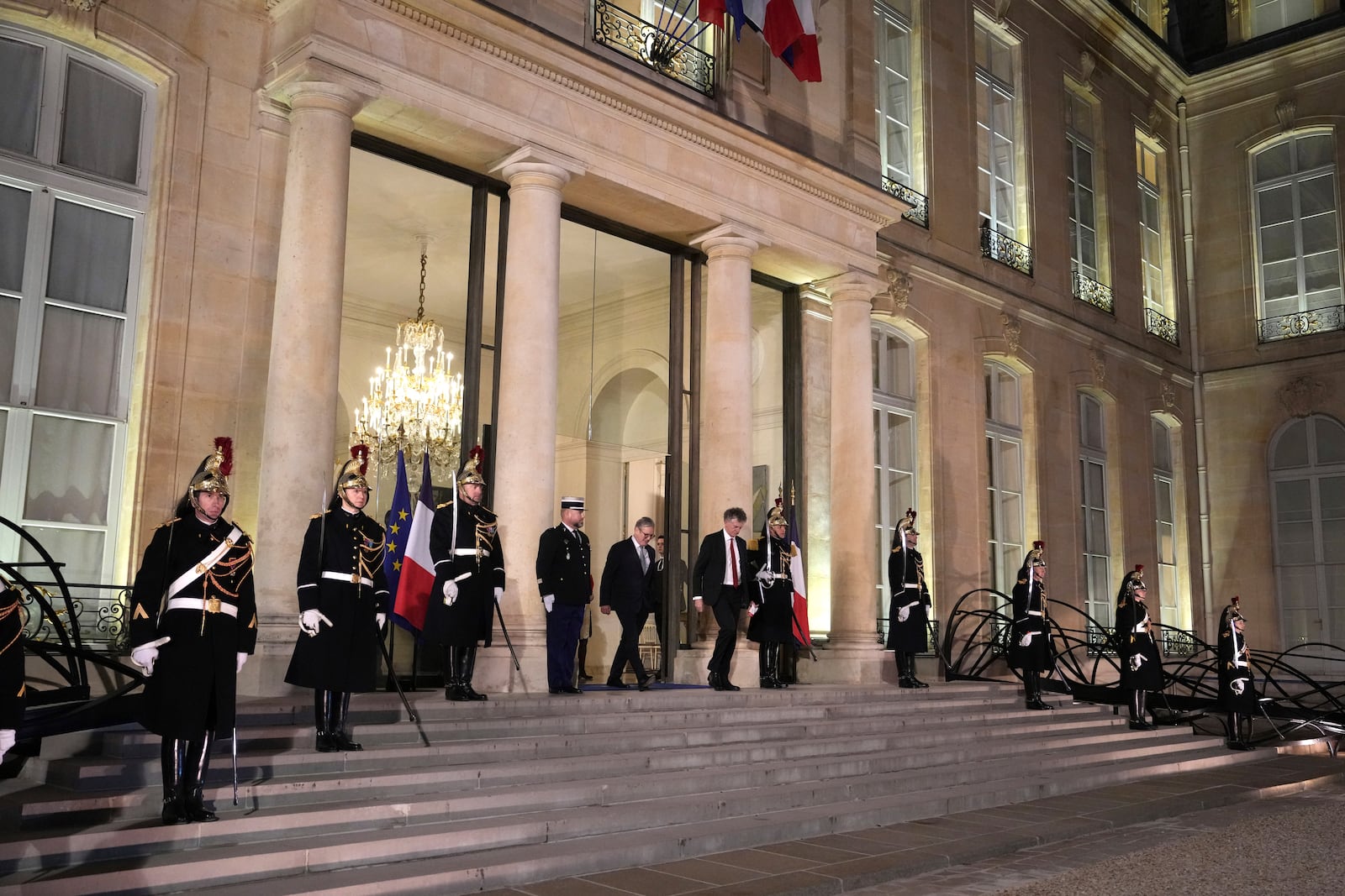 Britain's Prime Minister Keir Starmer, center left, leaves the Elysee Palace, after an informal meeting of leaders from key European Union nations and the United Kingdom, in Paris, Monday, Feb. 17, 2025. (AP Photo/Aurelien Morissard)