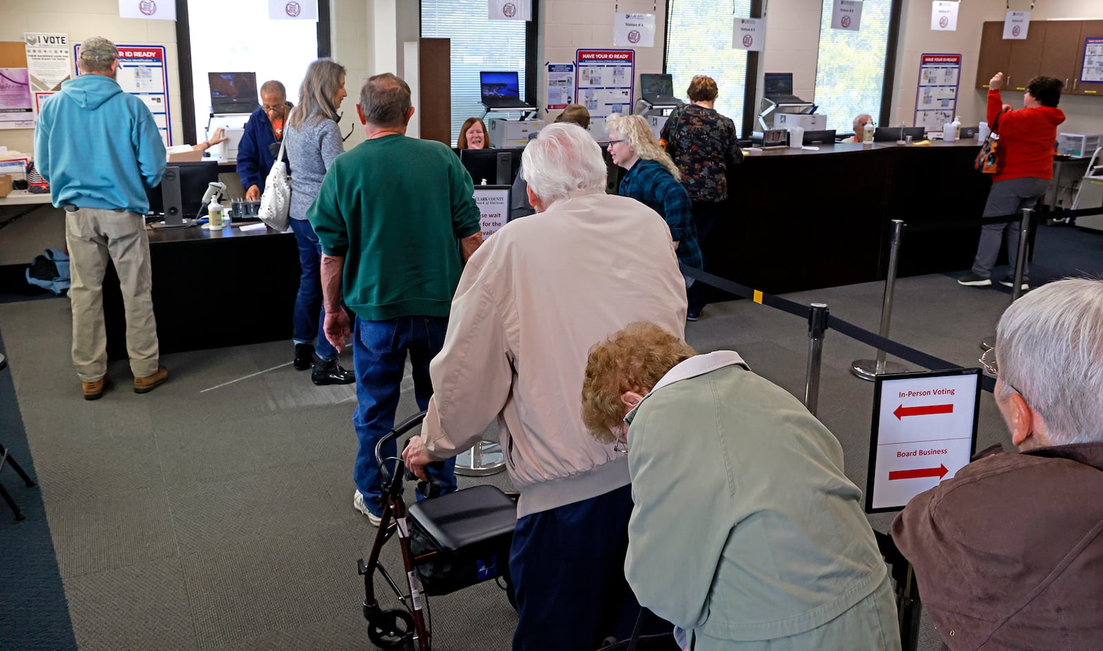 Early voters wait in line to register at the Clark County Board of Elections Thursday, Oct. 17, 2024. BILL LACKEY/STAFF