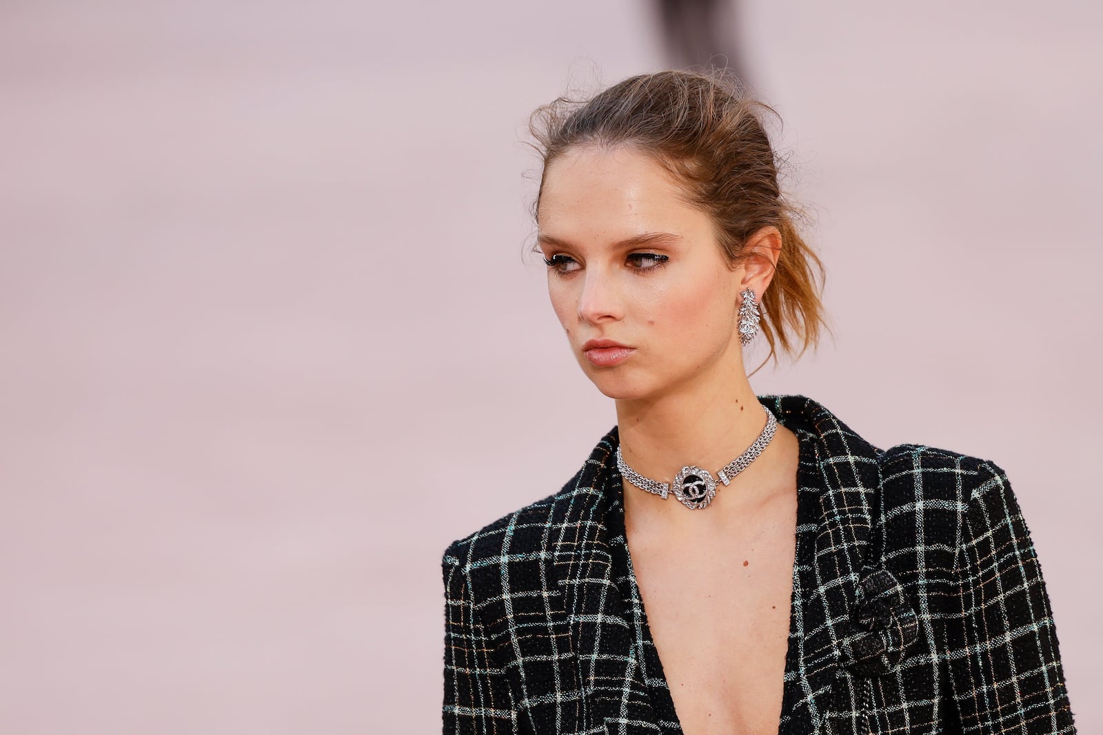 A model wears a creation as part of the Chanel Spring/Summer 2025 collection presented Tuesday, Oct. 1, 2024, in Paris. (Photo by Vianney Le Caer/Invision/AP)