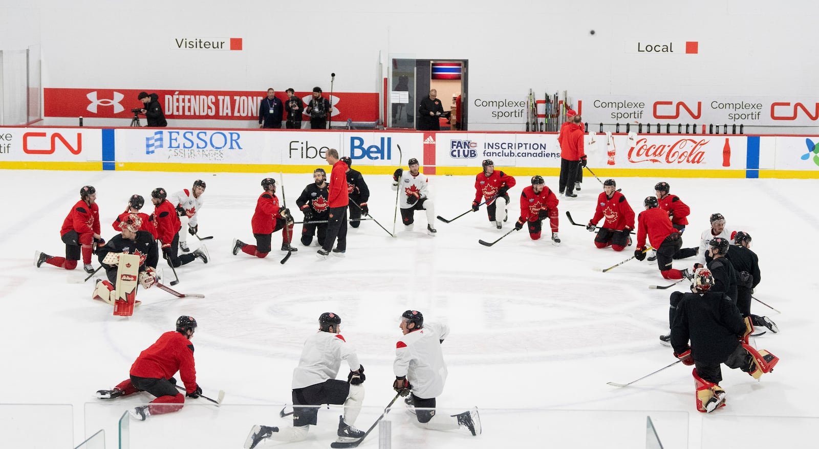 Canada players practice for the 4 Nations Face-Off hockey tournament in Brossard, Que., on Monday, Feb. 10, 2025. Canada will face Sweden on Feb. 12. (Christinne Muschi/The Canadian Press via AP)