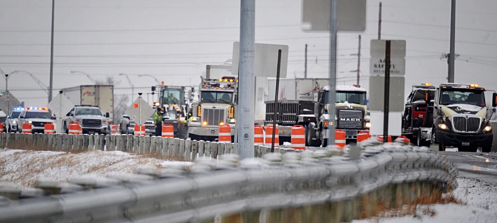 I-75 south was closed at US 35 west in Dayton Thursday, Feb. 11, 2021, after a semi crashed on the highway. MARSHALL GORBY/STAFF