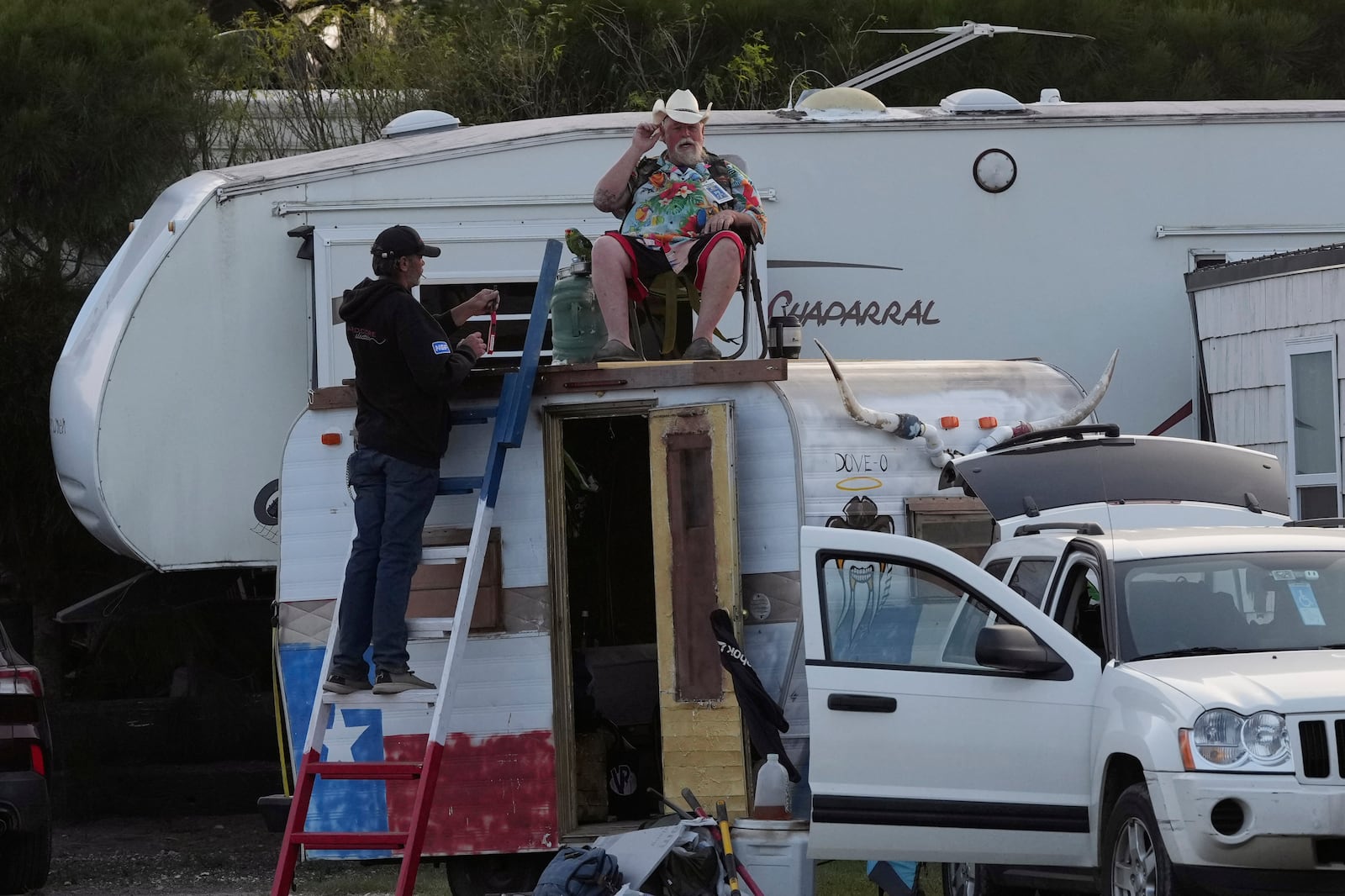 Visitor pack up after the SpaceX mega rocket Starship test flight from Starbase was scrubbed in Boca Chica, Texas, Monday, March 3, 2025. (AP Photo/Eric Gay)