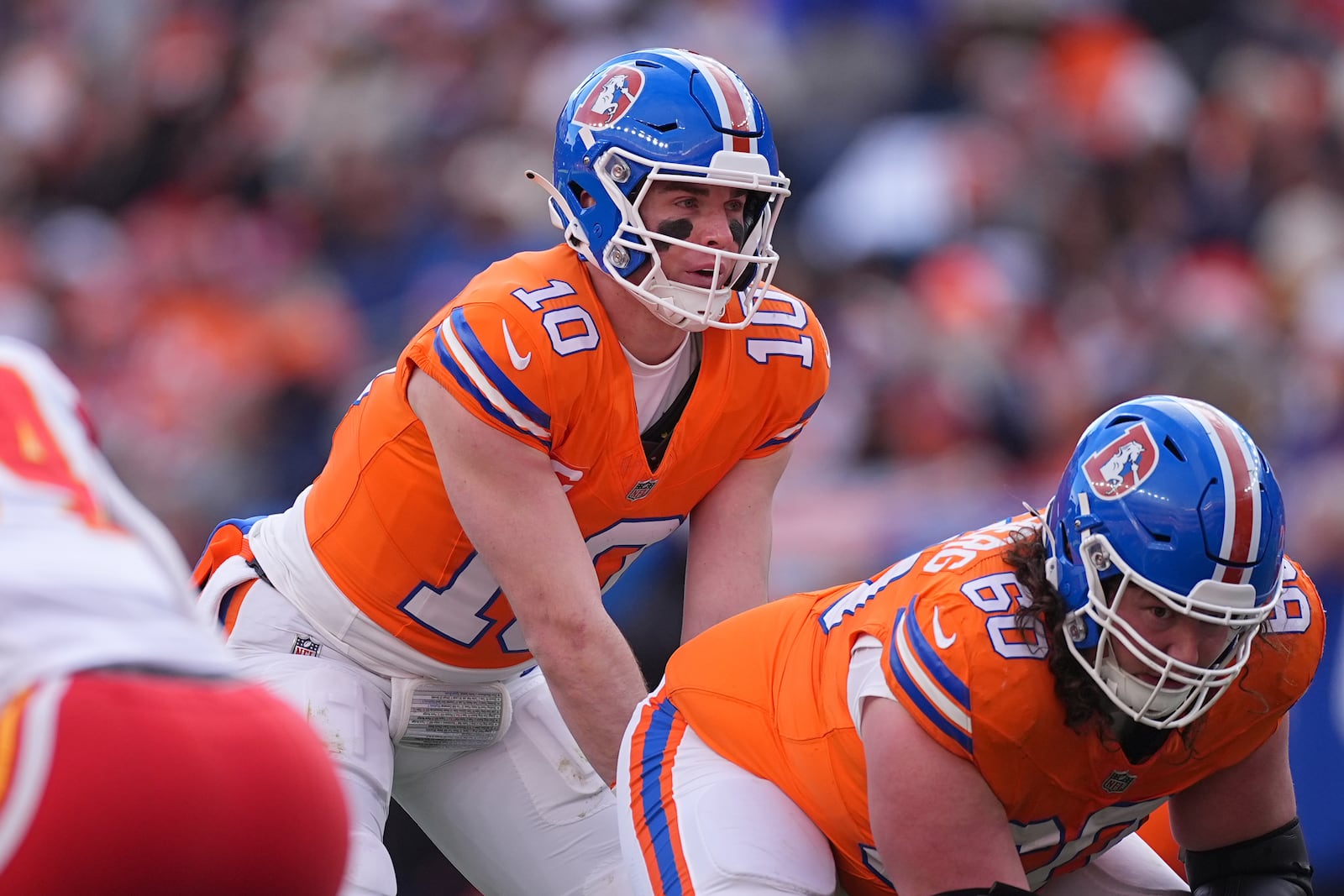 Denver Broncos quarterback Bo Nix waits for the snap during the first half of an NFL football game against the Kansas City Chiefs Sunday, Jan. 5, 2025, in Denver. (AP Photo/David Zalubowski)