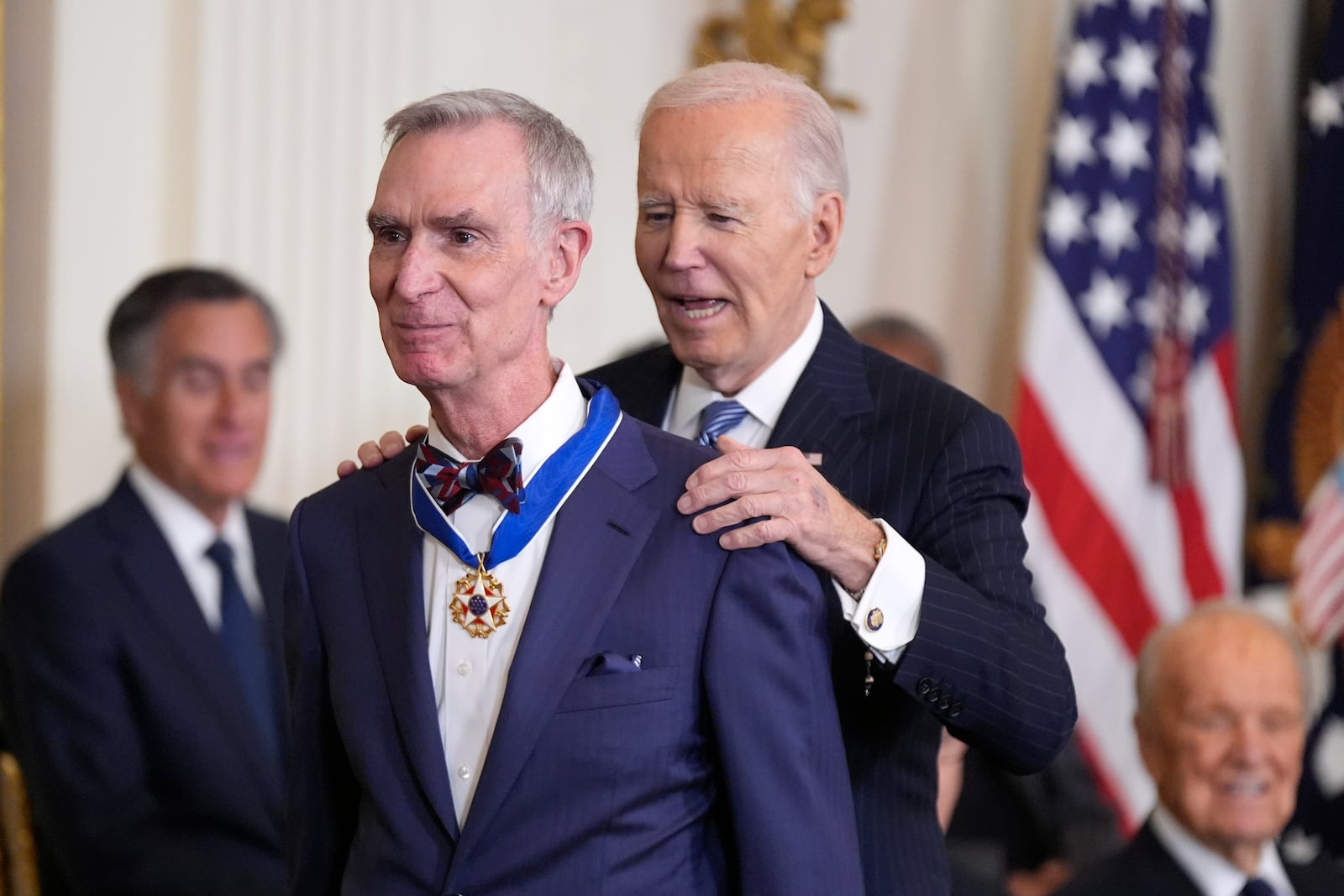 President Joe Biden, right, presents the Presidential Medal of Freedom, the Nation's highest civilian honor, to Bill Nye in the East Room of the White House, Saturday, Jan. 4, 2025, in Washington. (AP Photo/Manuel Balce Ceneta)