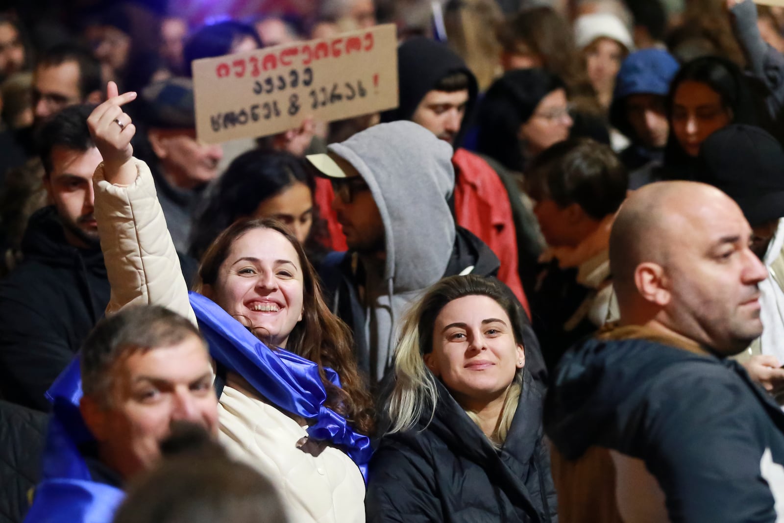 Demonstrators attend an opposition protest against the results of the parliamentary election in Tbilisi, Georgia, Monday, Oct. 28, 2024. (AP Photo/Zurab Tsertsvadze)