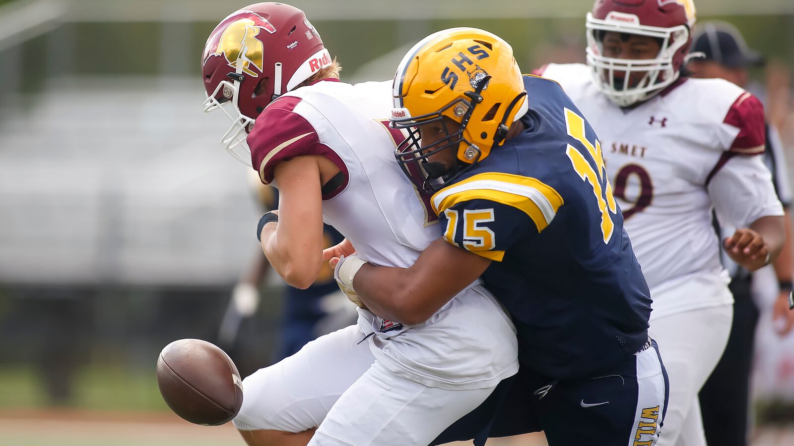 Springfield High School sophomore Jackson Heims stripped De Smet quarterback Dillon Duff during their game on Saturday afternoon at Brebeuf Jesuit Preparatory Academy in Indianapolis. The Wildcats won 29-22. Michael Cooper/CONTRIBUTED