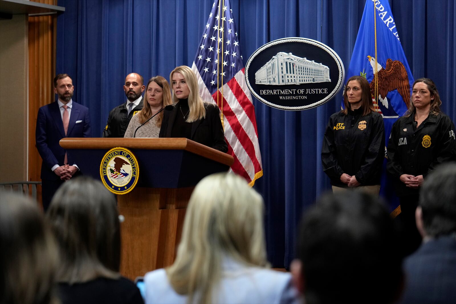 Attorney General Pam Bondi speaks at a news conference regarding immigration enforcement at the Justice Department, Wednesday, Feb. 12, 2025, in Washington. (AP Photo/Ben Curtis)