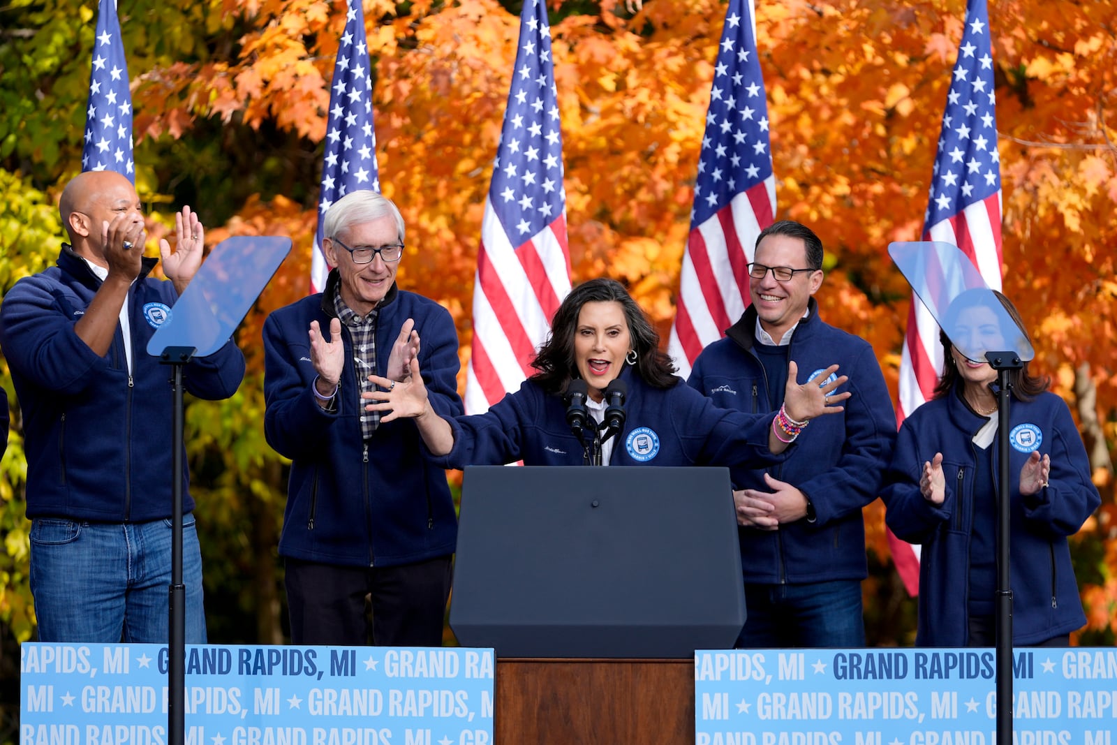 FILE - Michigan Gov. Gretchen Whitmer speaks, accompanied by Maryland Gov. Wes Moore, from left, Wisconsin Gov. Tony Evers, Pennsylvania Gov. Josh Shapiro and New York Gov. Kathy Hochul at a campaign event for Democratic presidential nominee Vice President Kamala Harris in Riverside Park, in Grand Rapids, Mich., Friday, Oct. 18, 2024. (AP Photo/Paul Sancya, File)