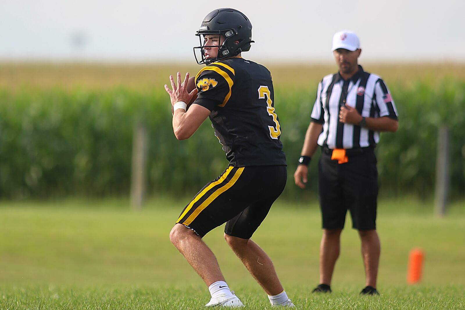 Shawnee High School quarterback RJ Griffin drops back to pass during their scrimmage game on Friday, Aug. 13 in Springfield. CONTRIBUTED PHOTO BY MICHAEL COOPER