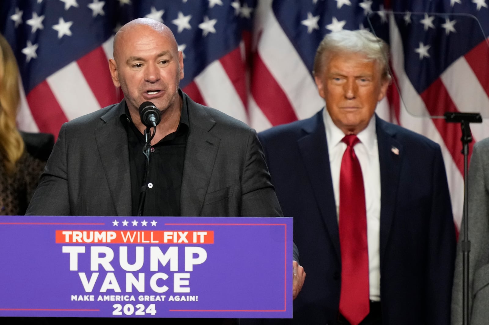 CEO of UFC Dana White speaks as speaksRepublican presidential nominee former President Donald Trump looks on at an election night watch party, Wednesday, Nov. 6, 2024, in West Palm Beach, Fla. (AP Photo/Alex Brandon)