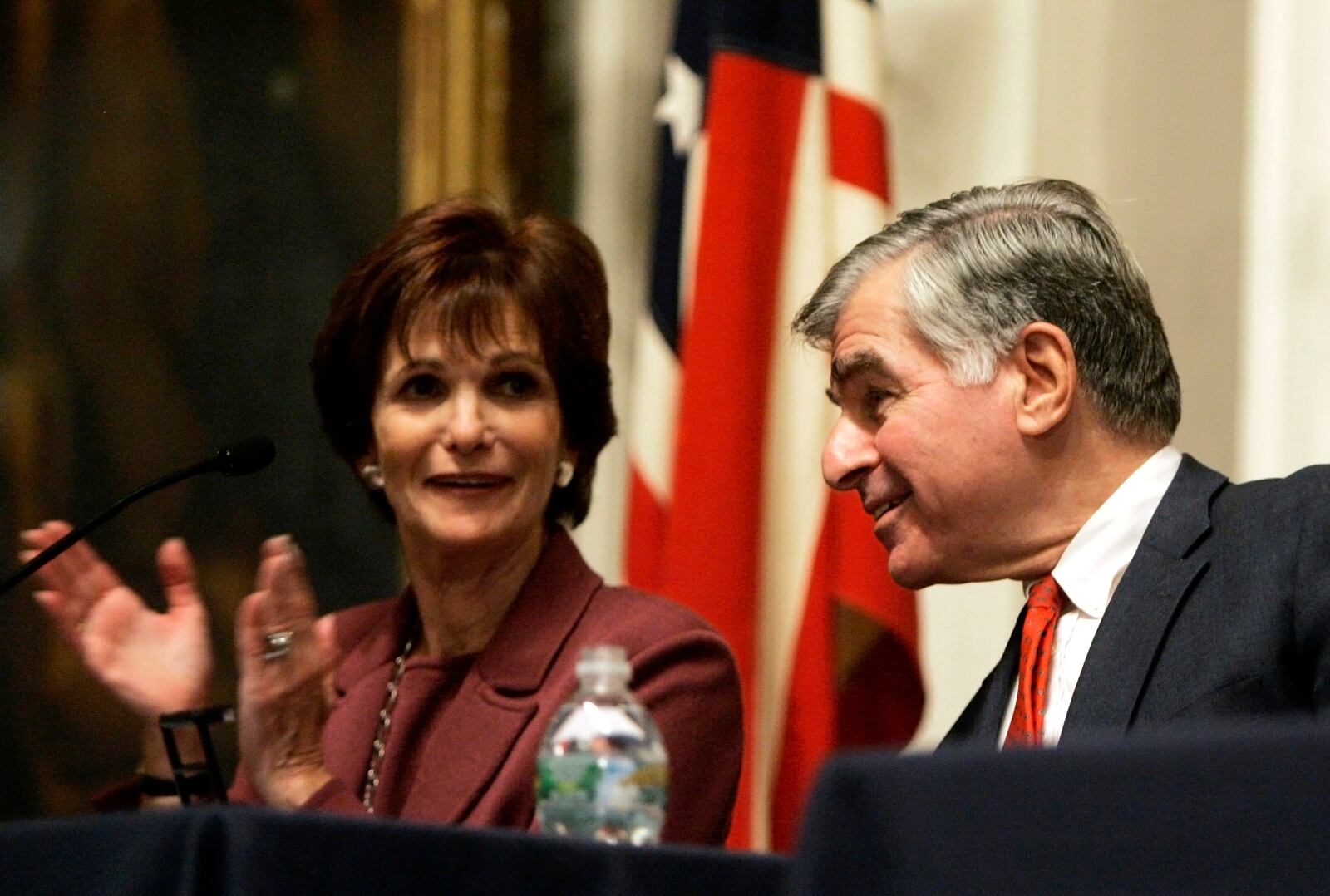 FILE - Former Massachusetts Gov. Michael Dukakis and his wife, Kitty, appear onstage prior to reading letters between John Adams and his wife, Abigail, during a Massachusetts Historical Society program at Faneuil Hall in Boston Monday, Nov. 19, 2007. AP Photo/Elise Amendola, File)