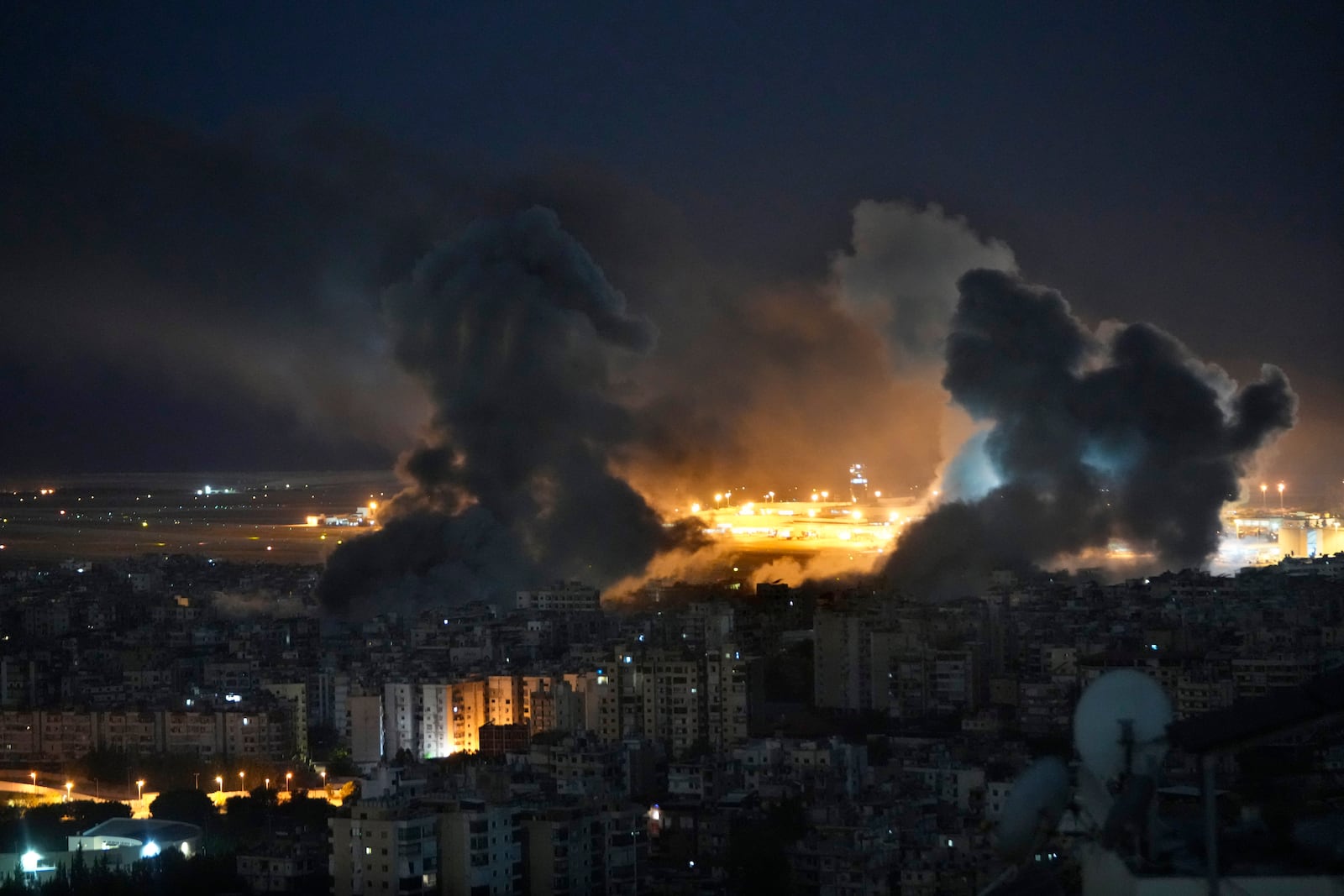 Smoke rise form Israeli airstrikes on Dahiyeh, in the southern suburb of Beirut, Lebanon, Sunday, Oct. 20, 2024. (AP Photo/Hussein Malla)