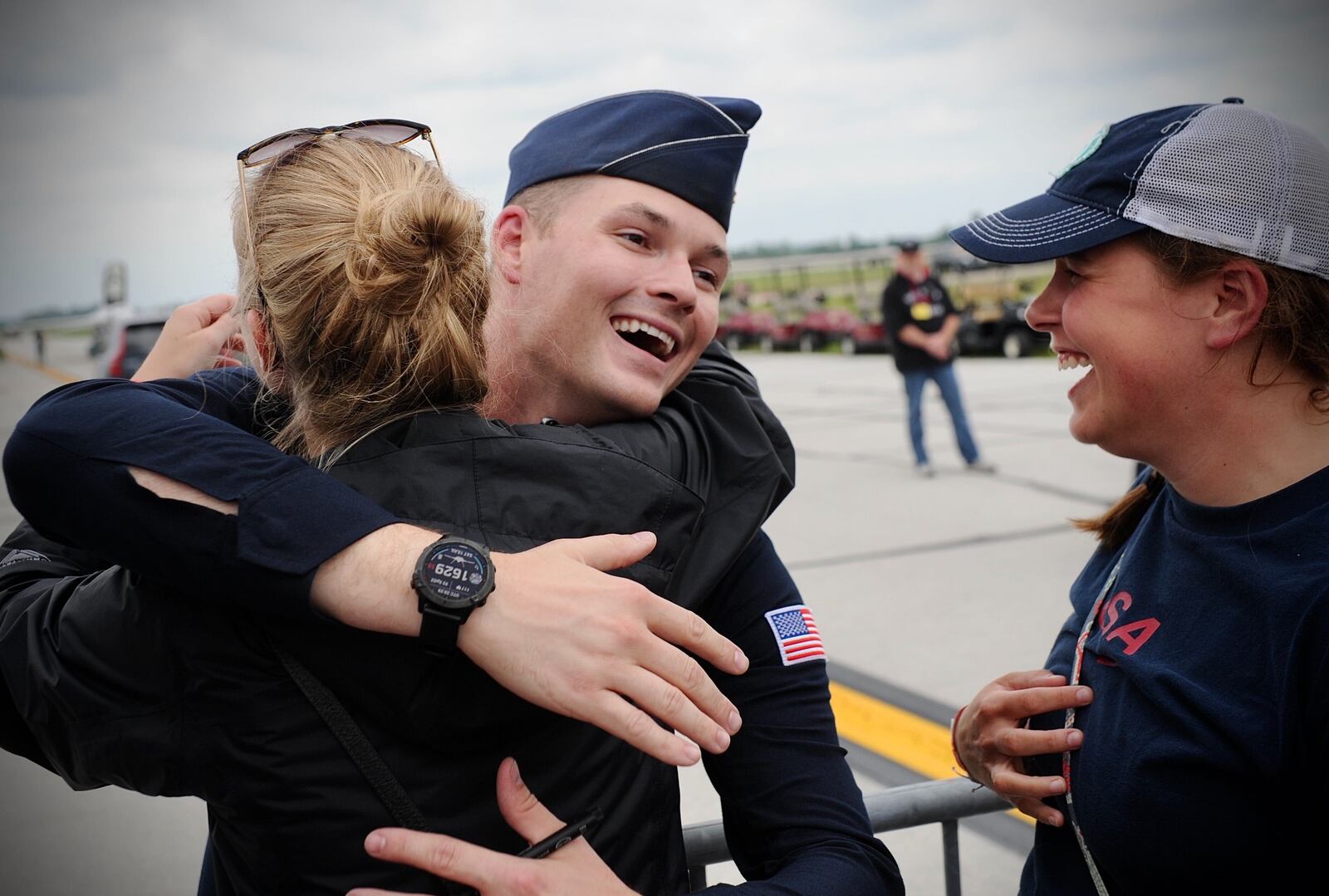 United States Air Force Thunderbird Pilot Maj. Kyle Oliver from Beavercreek greeted friends and family after his performance at the CenterPoint Energy Dayton Air Show Saturday July 10, 2021. MARSHALL GORBY\STAFF