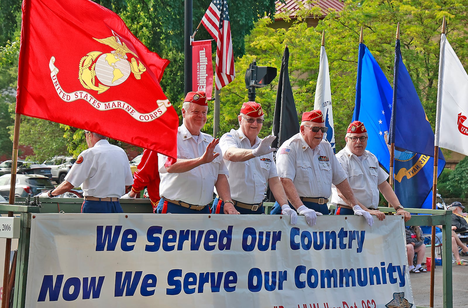 Thousands of people lined the parade route in their red, white and blue regalia to watch the 2023 Springfield Memorial Day Monday, May 29, 2023. The parade, which featured floats, fire trucks and bands, began with the throwing of the ceremonial wreath into Buck Creek and the somber sound of TAPS playing to honor those who haven given their lives in service to our country. BILL LACKEY/STAFF