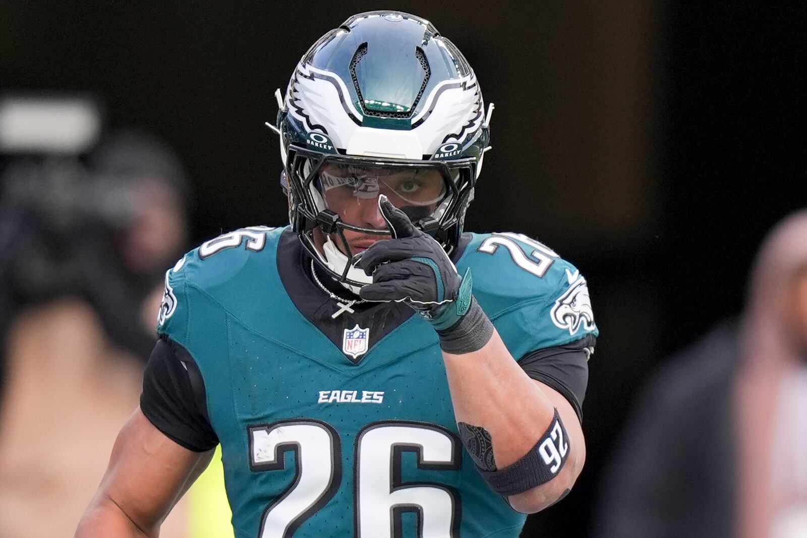 Philadelphia Eagles running back Saquon Barkley celebrates after scoring against the Washington Commanders during the first half of the NFC Championship NFL football game, Sunday, Jan. 26, 2025, in Philadelphia. (AP Photo/Chris Szagola)