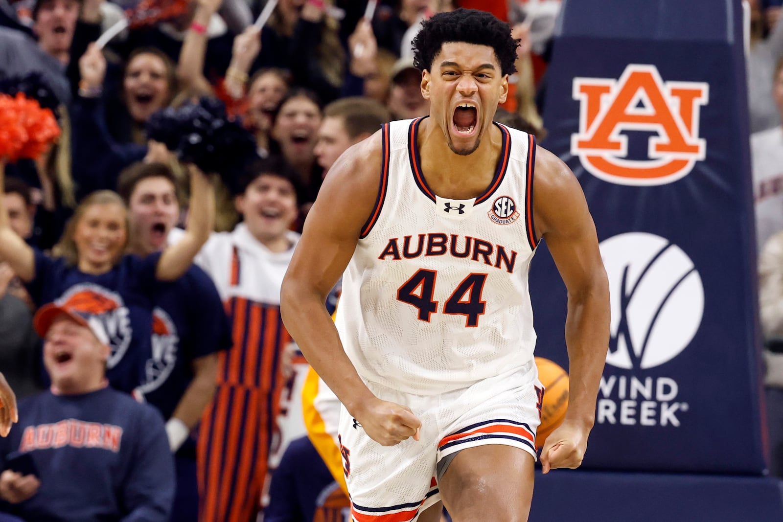 Auburn center Dylan Cardwell reacts after making a basket during the first half of an NCAA college basketball game against Tennessee, Saturday, Jan. 25, 2025, in Auburn, Ala. (AP Photo/Butch Dill)