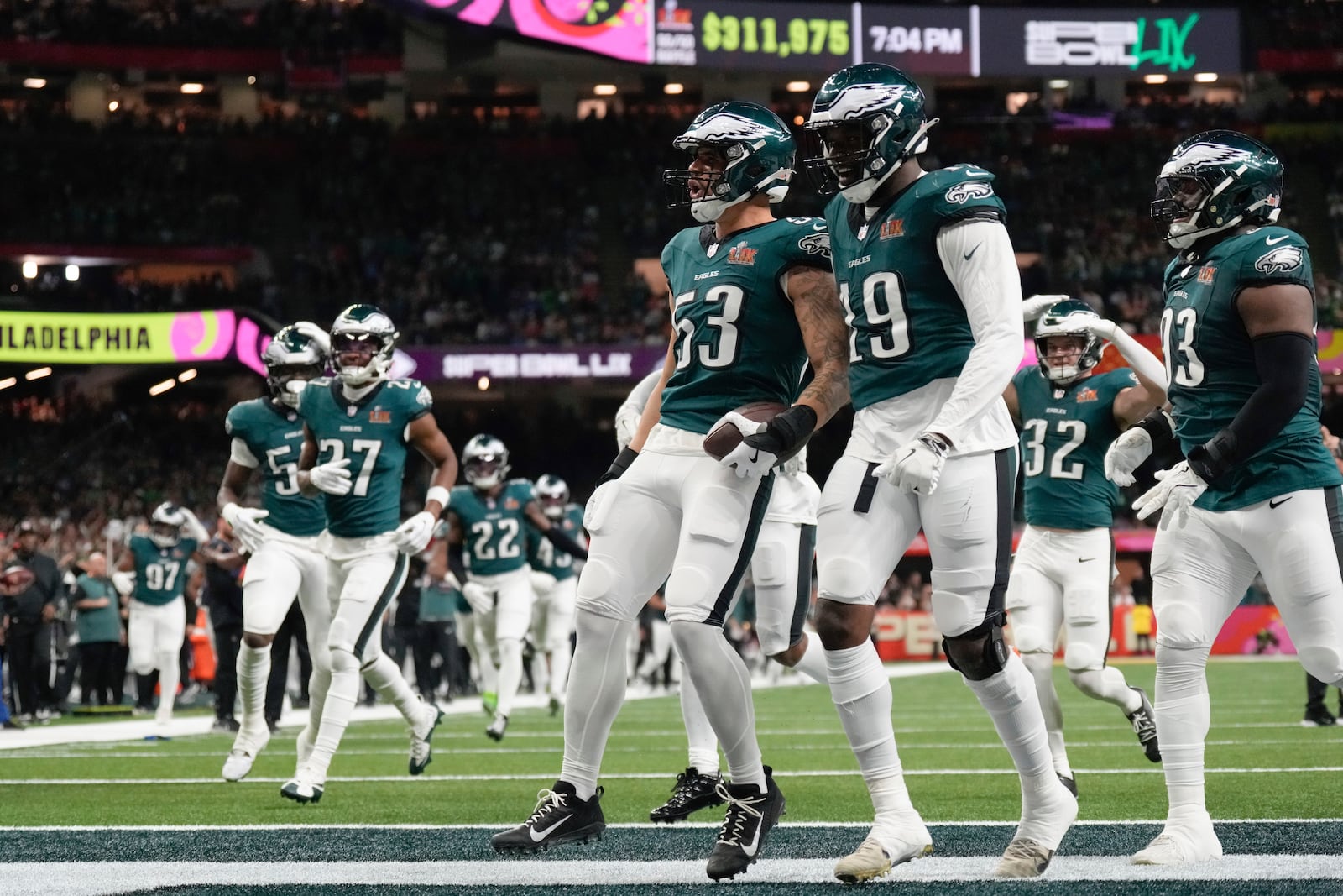 Philadelphia Eagles linebacker Zack Baun (53) celebrates with teammates after intercepting a pass during the first half of the NFL Super Bowl 59 football game against the Kansas City Chiefs, Sunday, Feb. 9, 2025, in New Orleans. (AP Photo/George Walker IV)