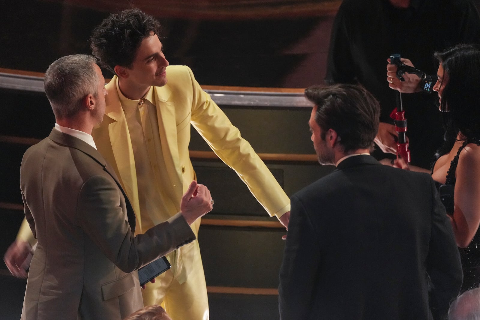 Jeremy Strong, from left, Timothee Chalamet, and Sebastian Stan in the audience during the Oscars on Sunday, March 2, 2025, at the Dolby Theatre in Los Angeles. (AP Photo/Chris Pizzello)