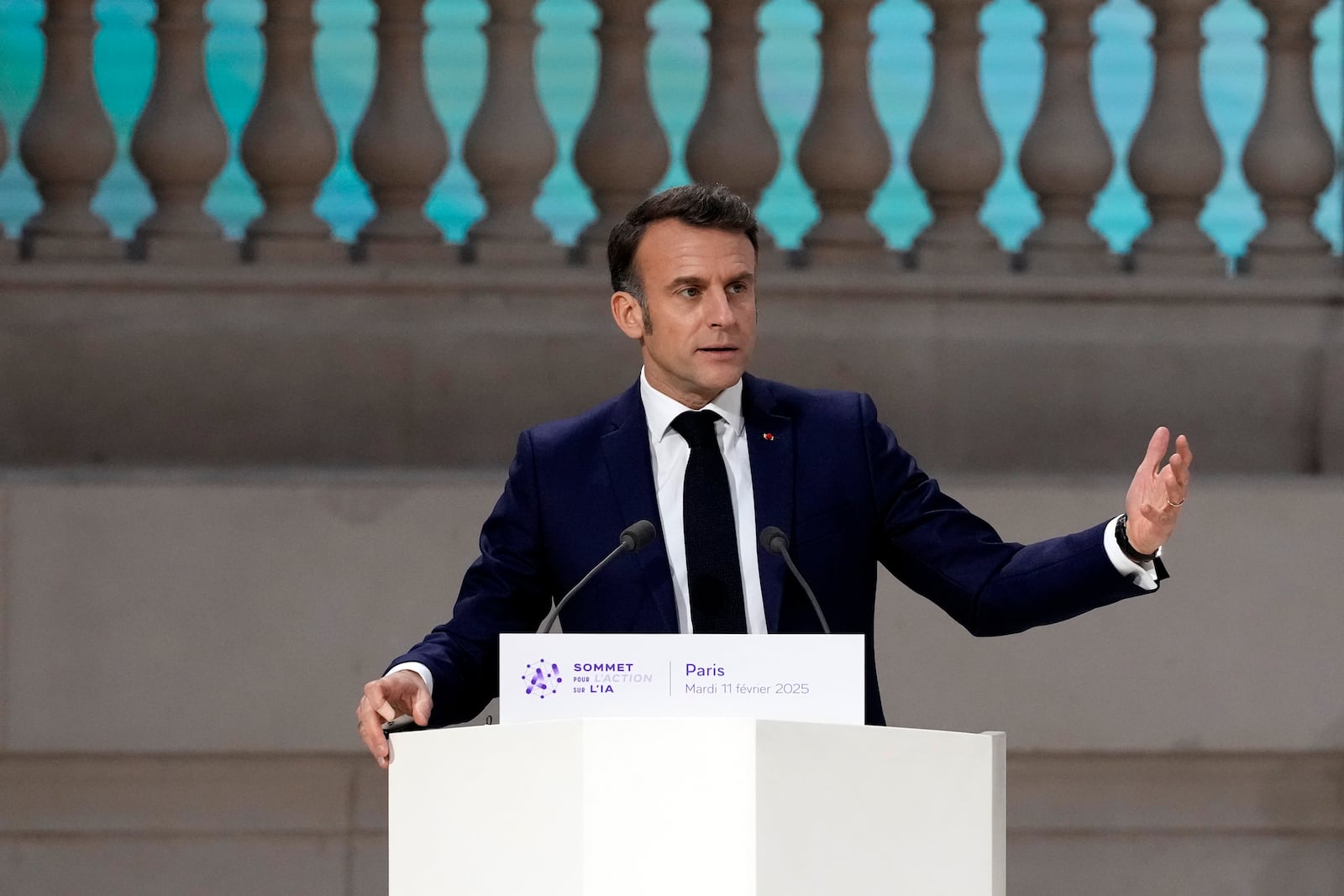 French President Emmanuel Macron addresses the audience in a closing speech at the Grand Palais during the Artificial Intelligence Action Summit in Paris, Tuesday, Feb. 11, 2025. (AP Photo/Michel Euler)