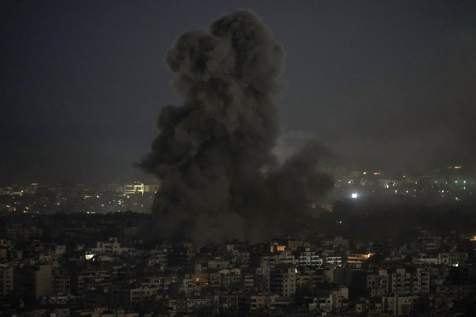 Smoke rises after an Israeli airstrike on Dahiyeh, in the southern suburb of Beirut, Lebanon, Saturday, Nov. 16, 2024. (AP Photo/Bilal Hussein)