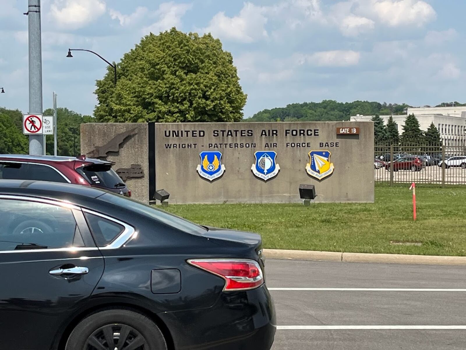 Vehicles leaving gate 1B at Wright-Patterson Air Force Base Tuesday afternoon. THOMAS GNAU/STAFF