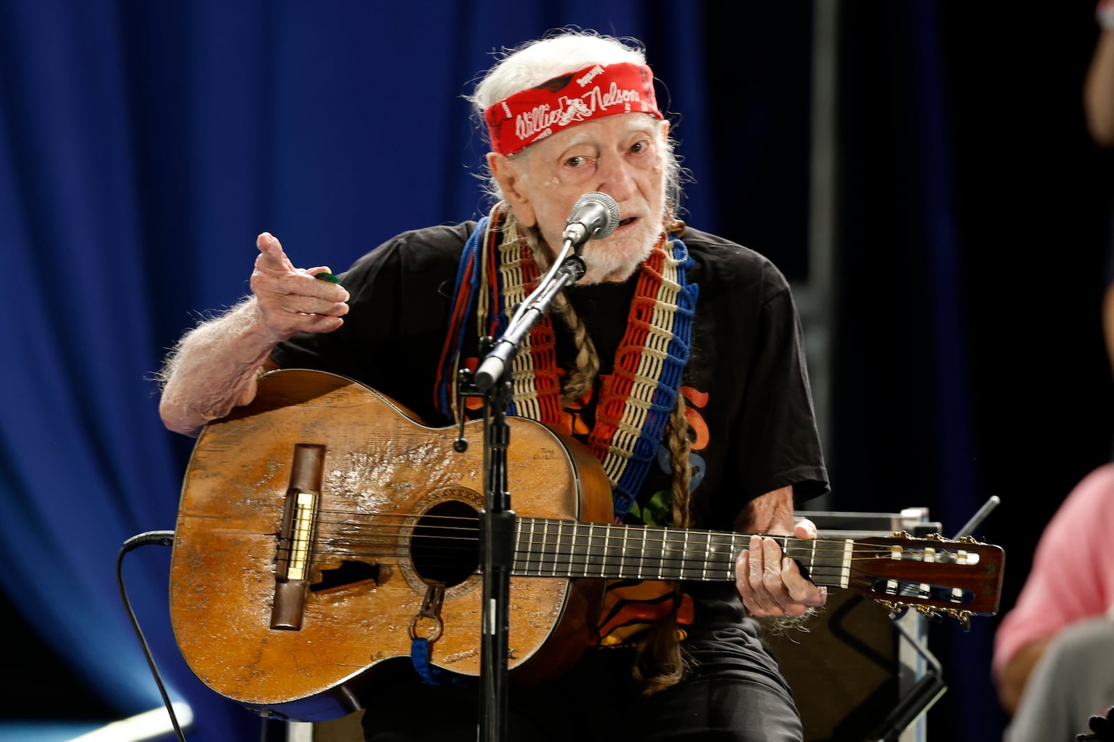 Willie Nelson performs during a campaign rally for Democratic presidential nominee Vice President Kamala Harris, Friday, Oct. 25, 2024, in Houston. (AP Photo/Annie Mulligan)