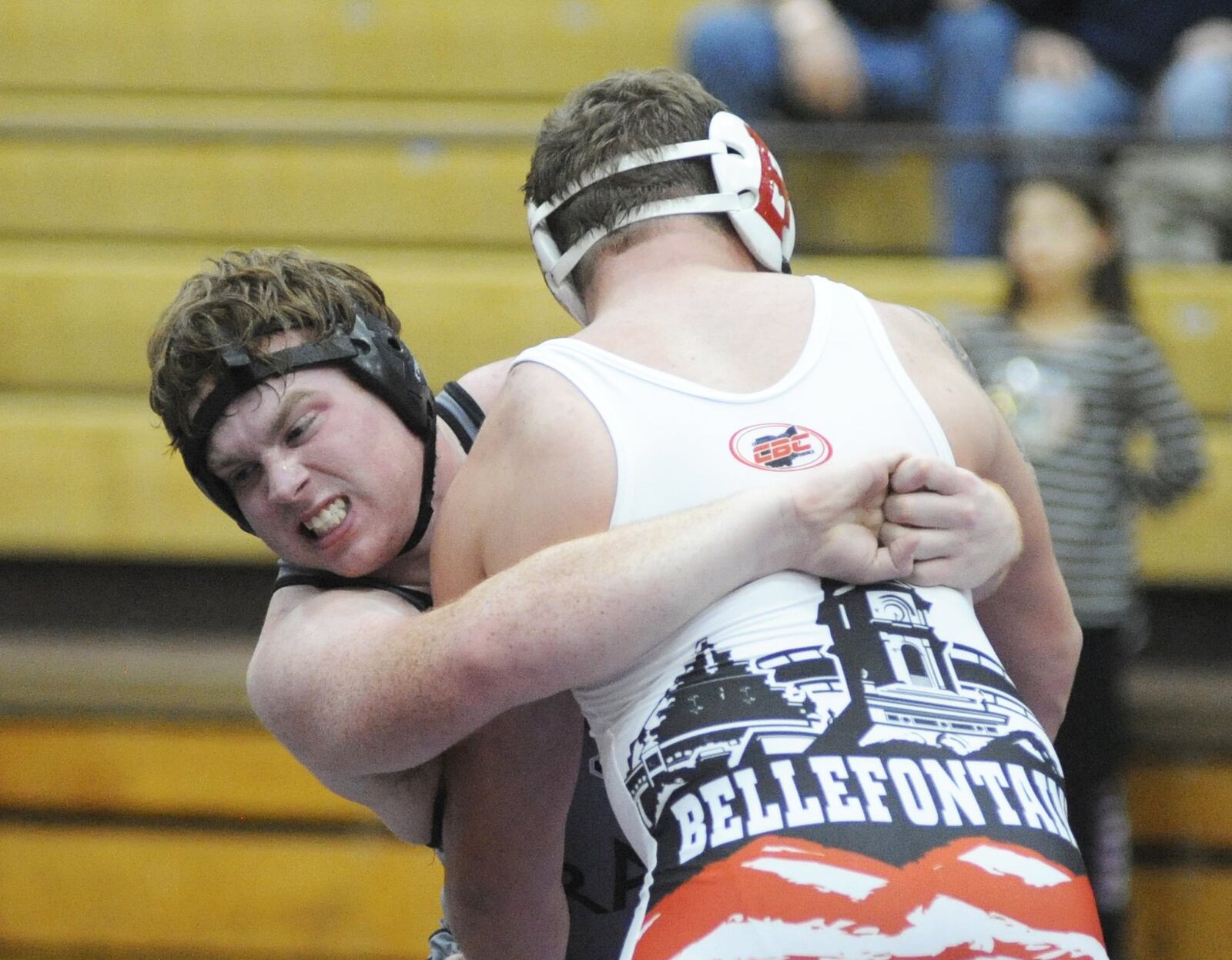 Trey Pence of Graham (left) was decisioned 5-3 by Bruno Pattison of Bellefontaine in the 220-pound final of the GMVWA Holiday Wrestling Tournament at Vandalia on Friday, Dec. 28, 2018. MARC PENDLETON / STAFF