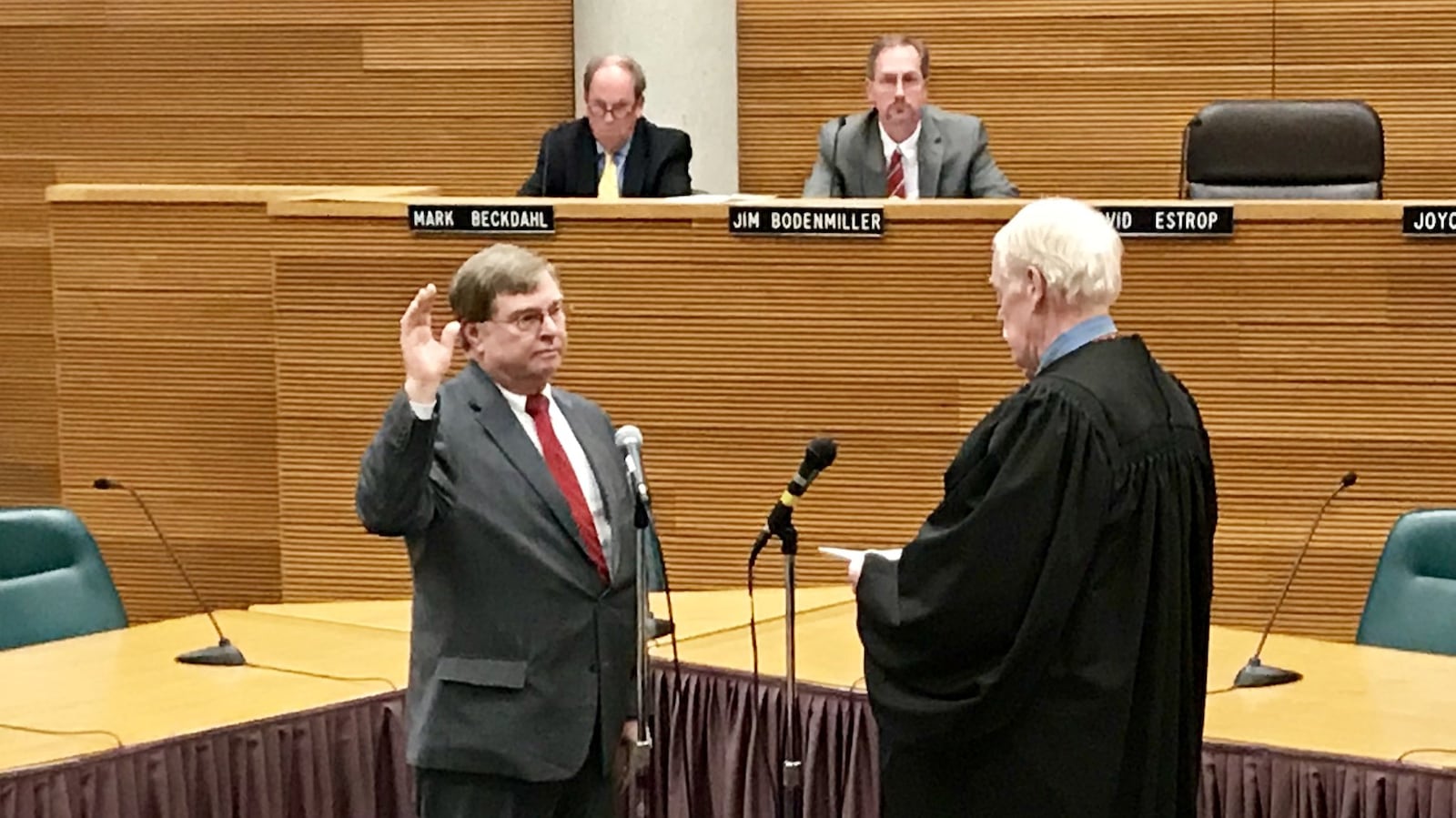 Springfield City Commissioner David Estrop was sworn in for his first term on Tuesday evening by Judge Richard O’Neill. MICHAEL COOPER/STAFF