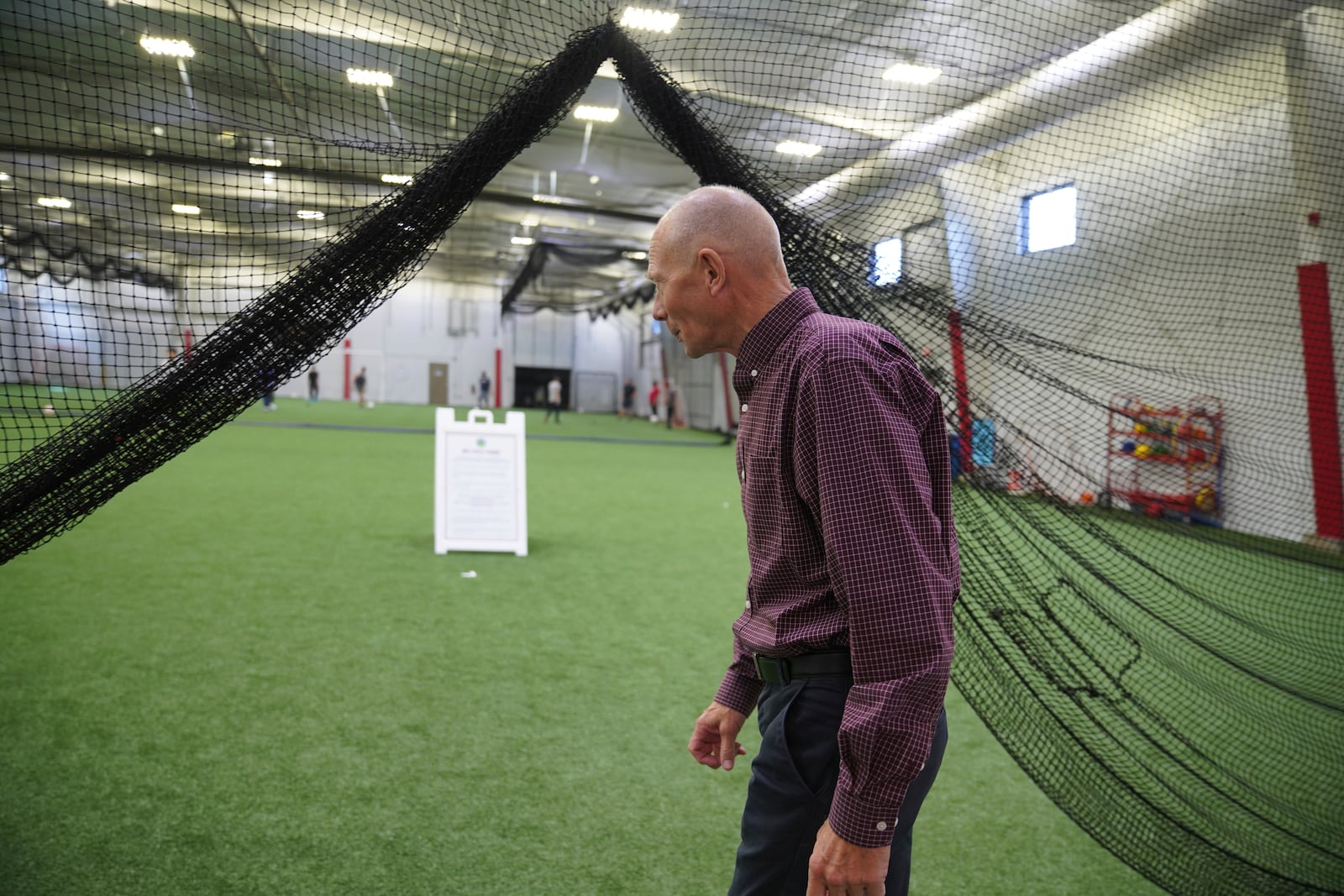 Steve Robinson, Worthington’s city administrator walks into the newly constructed JBS Fieldhouse on Monday, Oct. 21, 2024, in Worthington, Minn. (AP Photo/Jessie Wardarski)