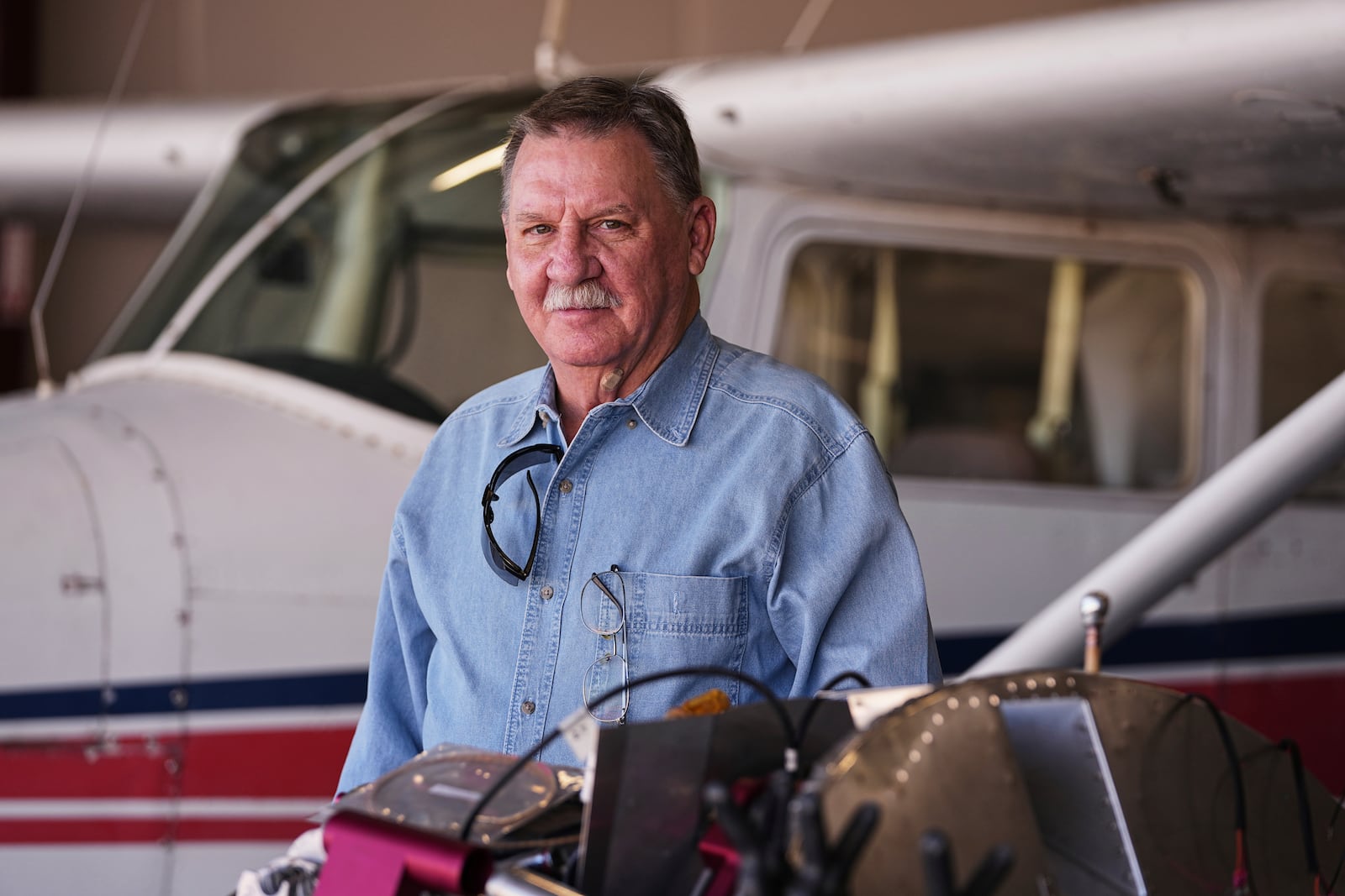 Former Army and Navy Vietnam veteran Richard Lamb, poses for a photo at the EAA Museum at McGregor Executive Airport in McGregor, Texas, Sunday, March 2, 2025. (AP Photo/Tony Gutierrez)