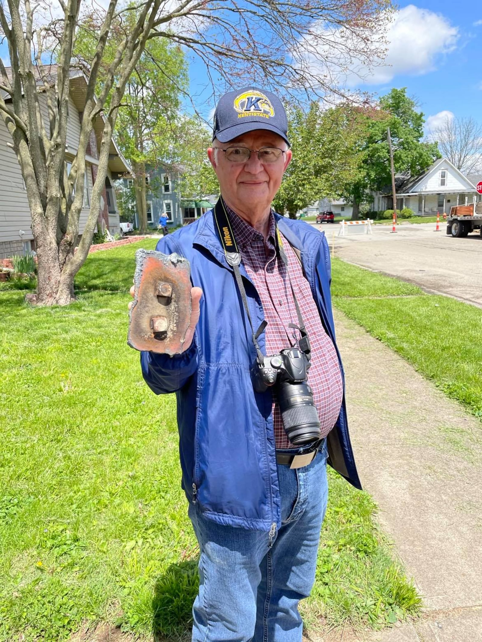 Larry Allington holds a bolted section of the tower he saved for the First Presbyterian Church.  PAM COTTREL/CONTRIBUTOR