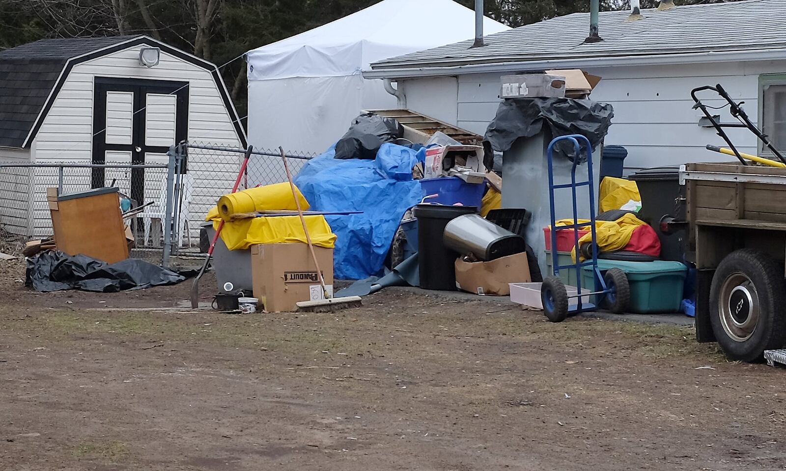 The owner of the property at 1312 Beverly Avenue has started to clean up the mess on his property Wednesday after neighbors and the city complained. Bill Lackey/Staff