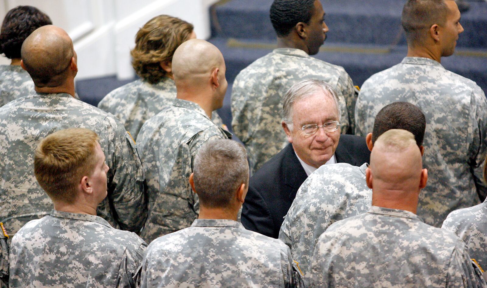 U.S. Congressman Dave Hobson (R-Oh.) shakes hands with servicemen and women during a welcome home ceremony for thirty Ohio National Guard soldiers with the Springfield-based 237th Forward Support Battalion Saturday morning.  The unit returned from a year-long deployment to Mosul, Iraq, in support of Operation Iraqi Freedom.
Staff Photo by Barbara J. Perenic