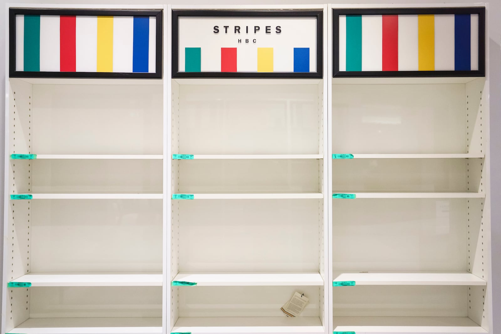 Empty shelves are seen at a Hudson's Bay department store in Toronto, Monday, March 17, 2025. (Christopher Katsarov/The Canadian Press via AP)