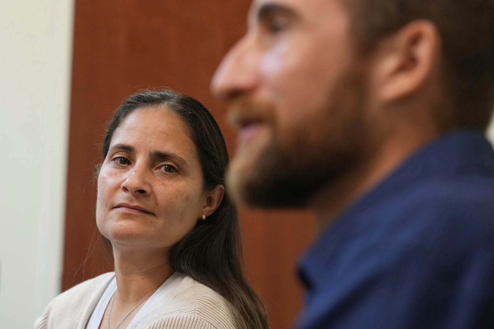 Border Patrol processing coordinator Yaira Santiago listens to Federal Wildlife officer Cody Smith during a scenario training session, Wednesday, Nov. 20, 2024, in Dania Beach, Fla. (AP Photo/Marta Lavandier)