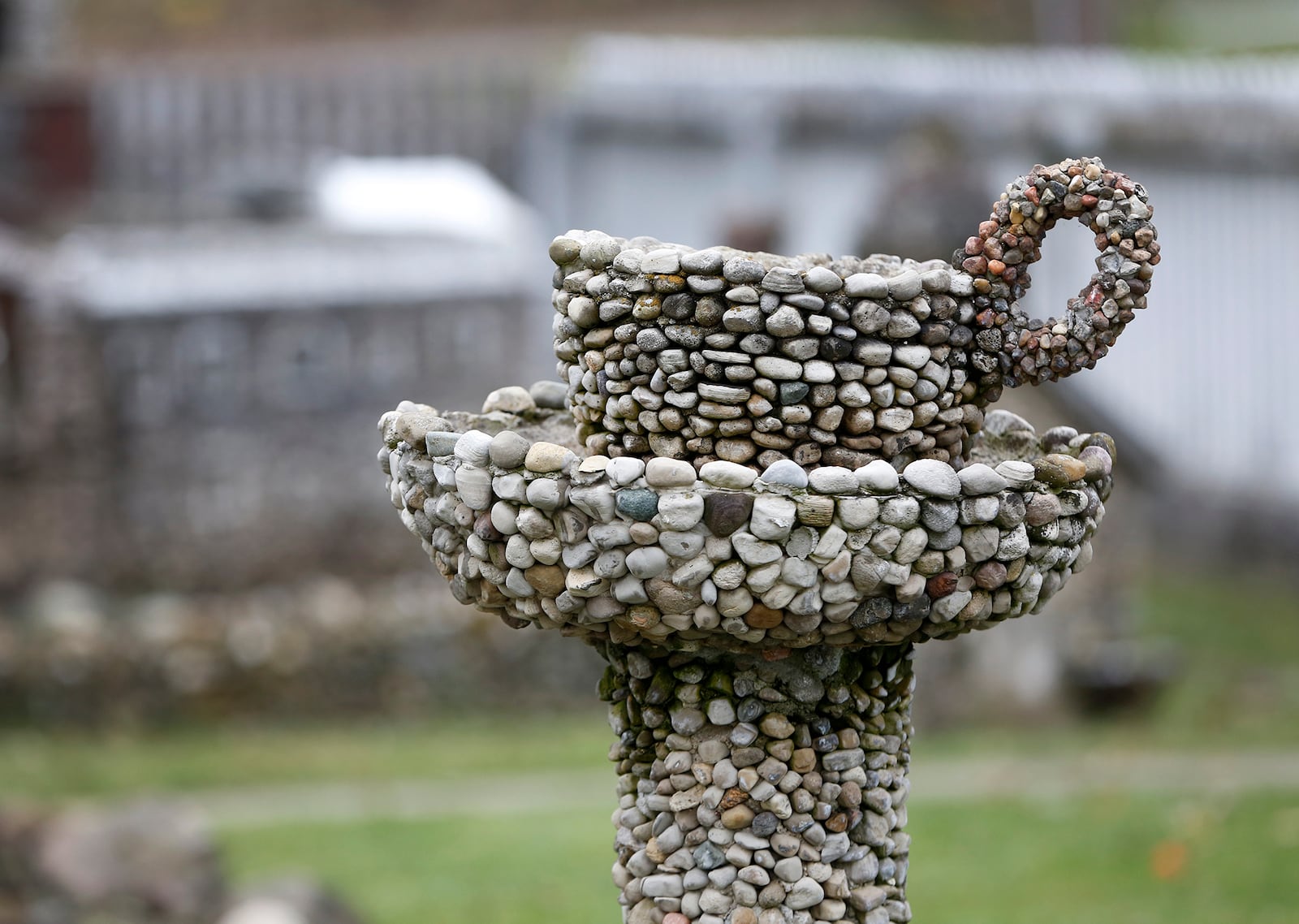 Harry George "Ben" Hartman's wife Mary said her husband loved coffee. "He always liked coffee- Maxwell House Coffee - and always had me have a pot brewing when he was working." Hartman created a coffee cup and saucer for the Hartman Rock Garden out of of concrete, steam gravel and mixed stones. LISA POWELL / STAFF