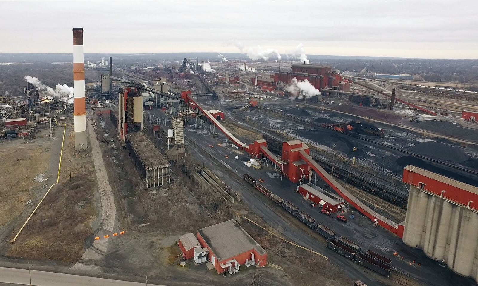 Aerial view of the AK Steel Middletown Works. The big steel producer covers more than 2,700 acres in the city to operate coke ovens, a blast furnace, hot strip mill and more than a dozen other steel production related processes. TY GREENLEES / STAFF