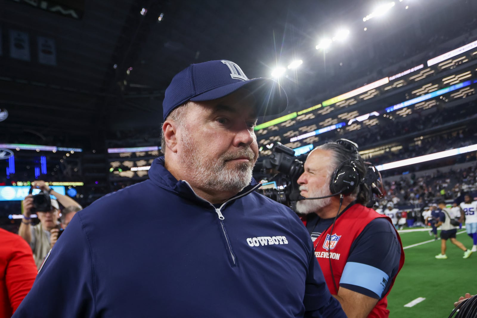 Dallas Cowboys head coach Mike McCarthy walks on the field following an NFL football game against the Houston Texans, Monday, Nov. 18, 2024, in Arlington, Texas. The Texans won 34-10. (AP Photo/Gareth Patterson)