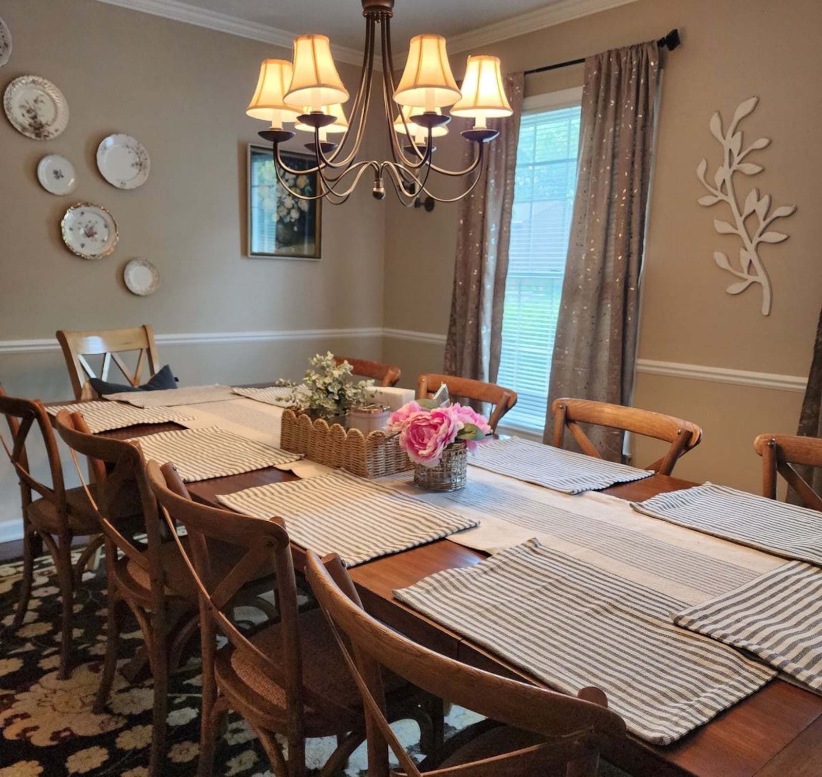 Recent updates to the dining room include a bigger table that seats 10, so “everyone can come over.” CONTRIBUTED 