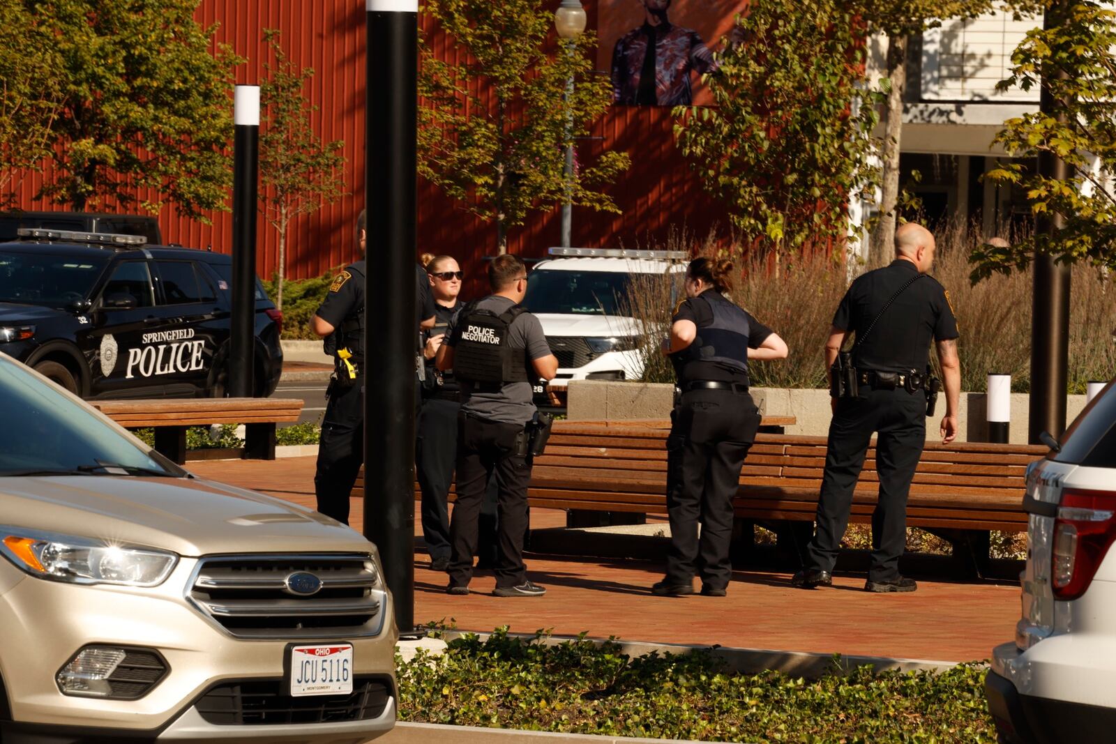 Springfield and Dayton police, along with the State Highway Patrol, search the Springfield City Hall after it was evacuated due to a threat in September. BILL LACKEY/STAFF