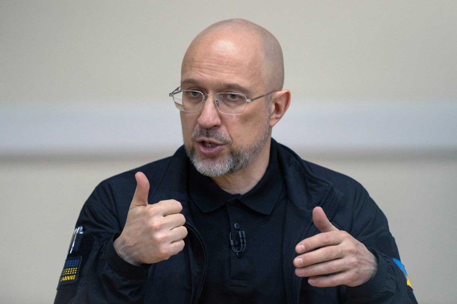 Ukrainian Prime Minister Denys Shmyhal speaks during a press conference in Kyiv, Ukraine, Tuesday, March 4, 2025. (AP Photo/Efrem Lukatsky)